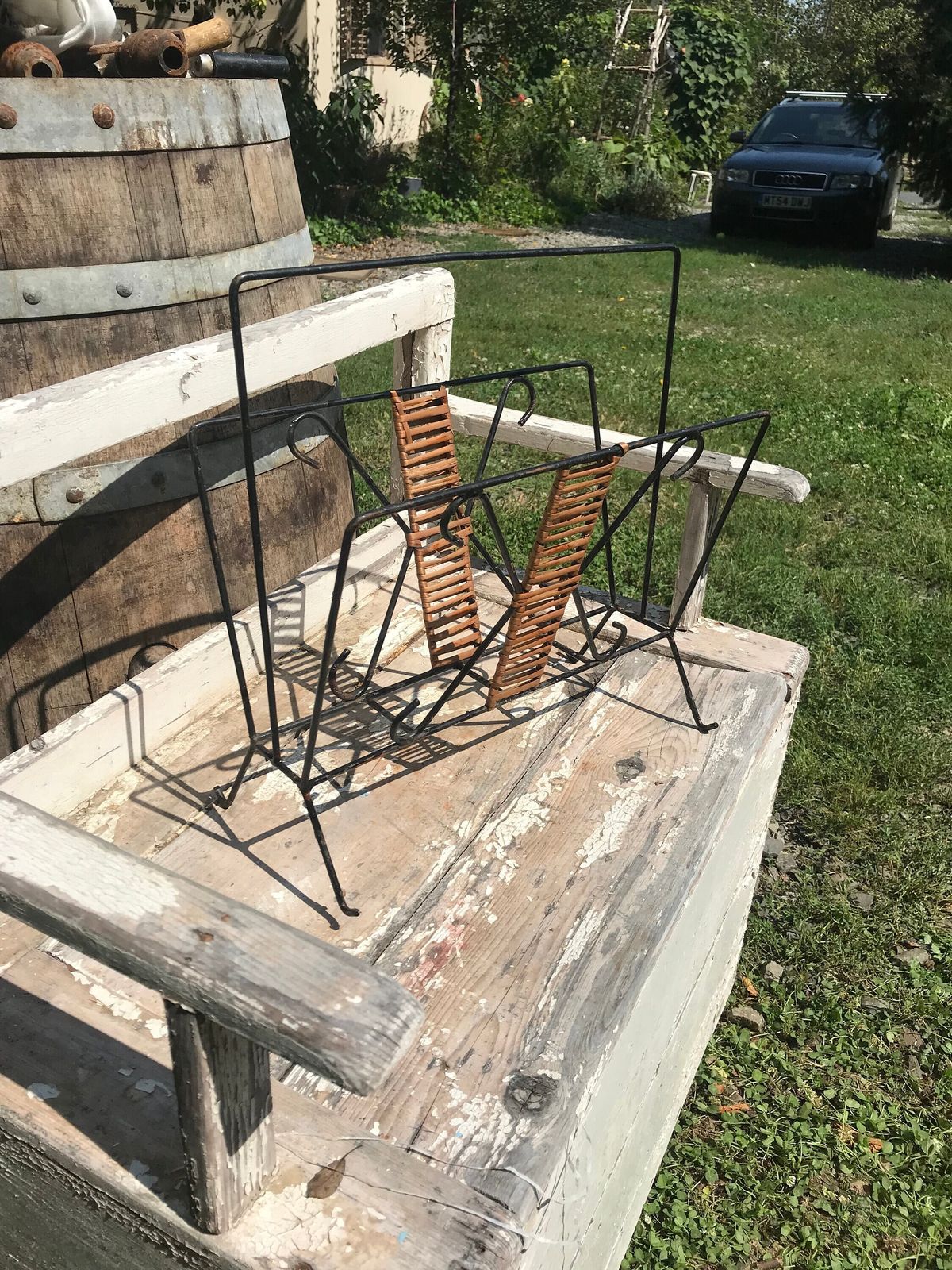 Metal Magazine Rack 1950s Black With Wicker Weave Newspaper Holder Bent Metal Display Stand, Eye Catching Cheerful And Unique Books Organise photo furniture