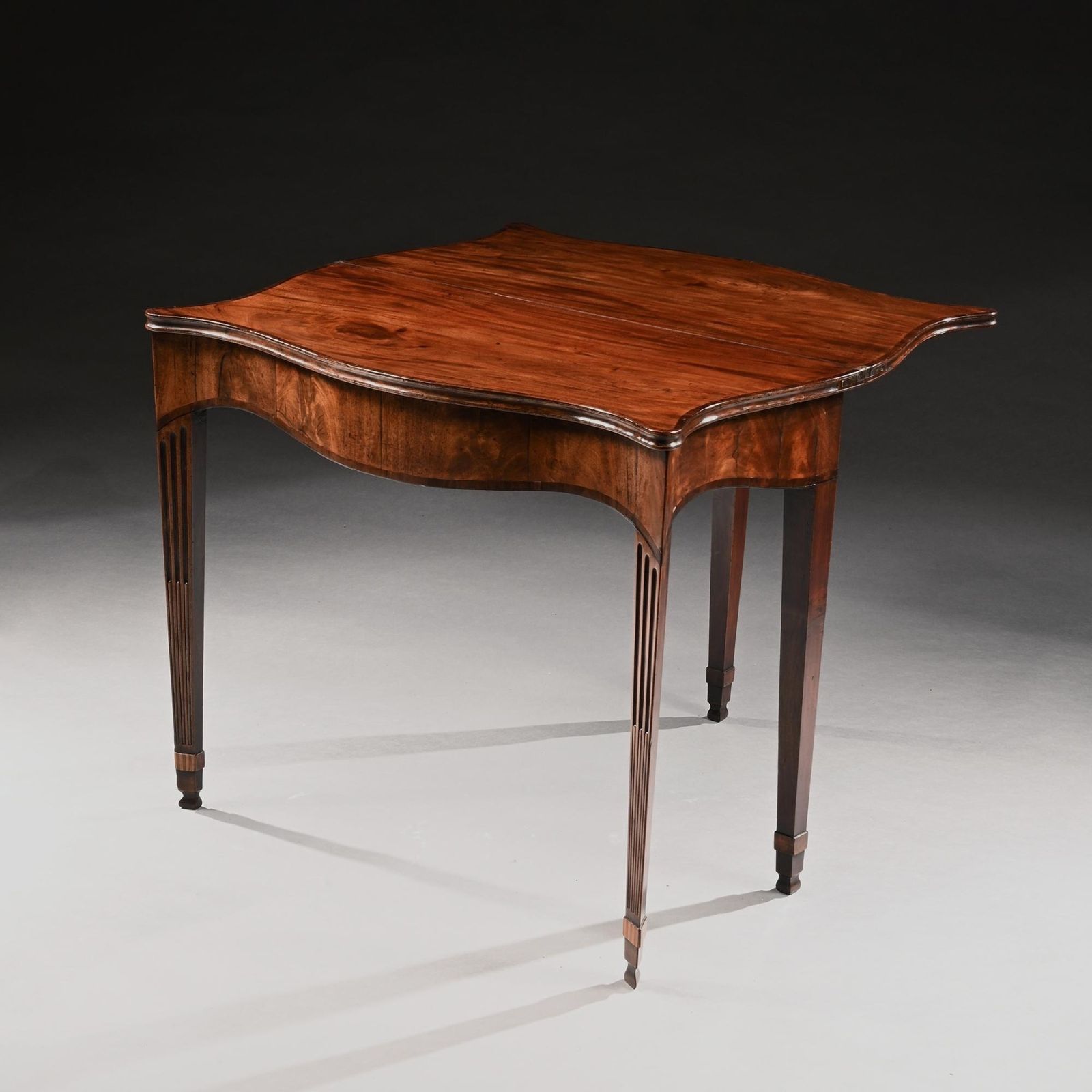 George III Mahogany Serpentine Tea Table Of Exceptional Colour And Patination