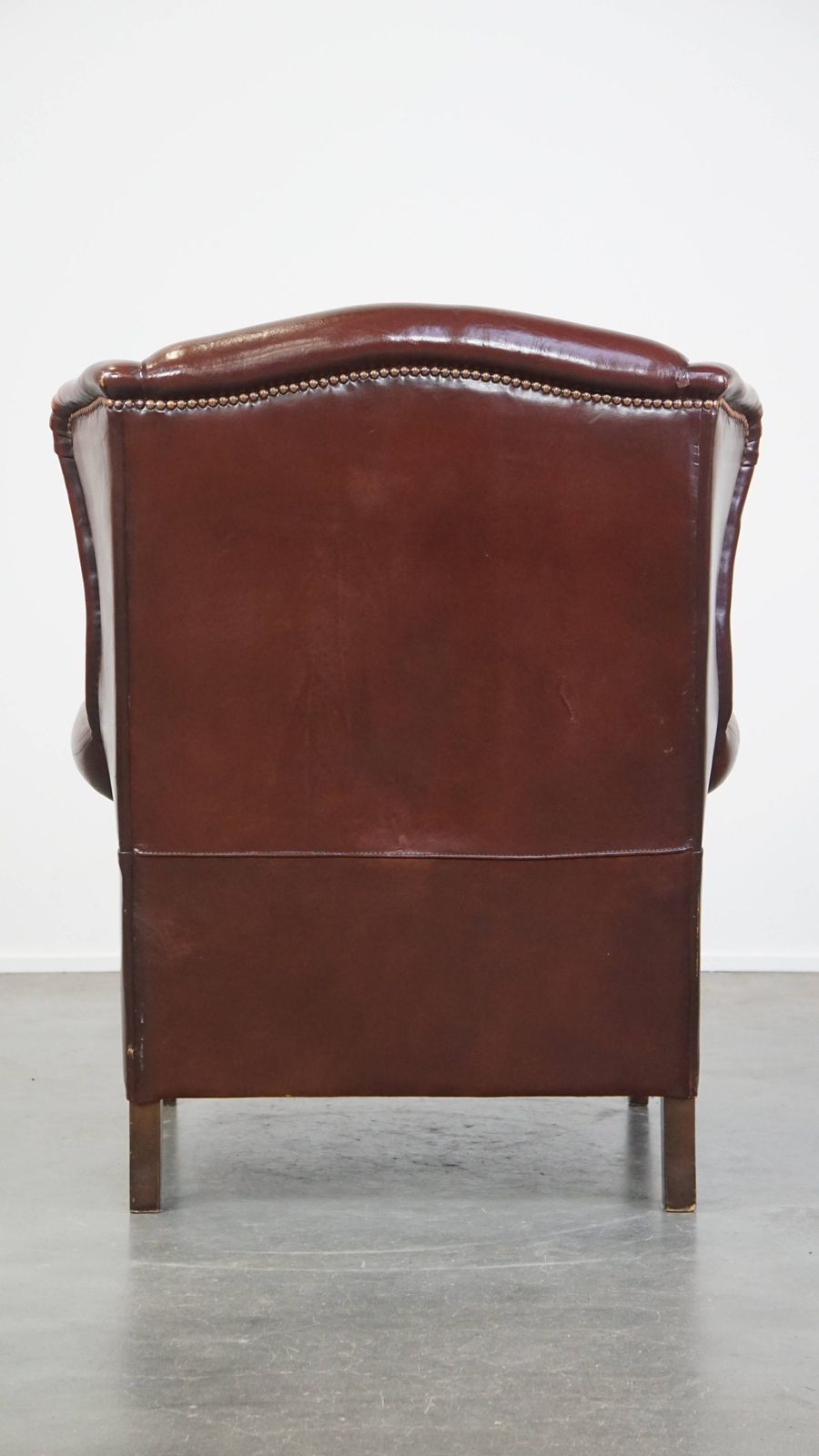 Classic, Luxurious And Comfortable Dark English Style Sheepskin Wing Chair With Lots Of Character And A Beautiful Patina photo Furniture