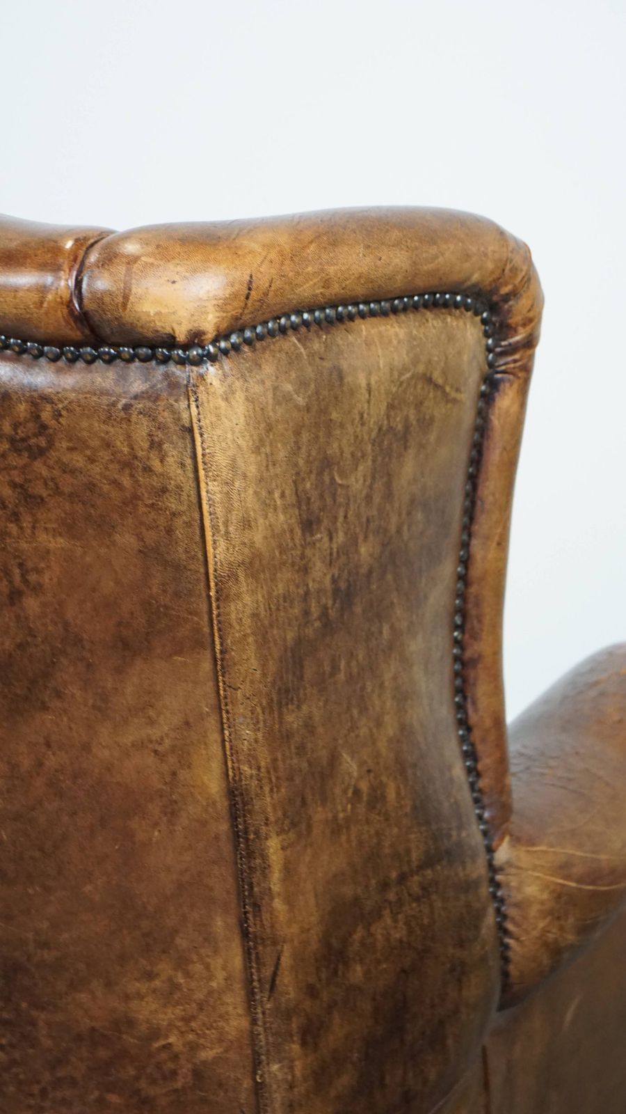 Furniture Large, Characterful And Comfortable Vintage English Style Sheepskin Wing Chair With A Beautiful Patina photo