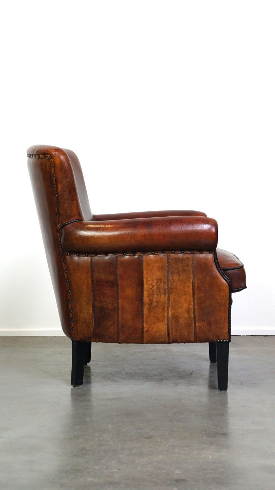 Comfortable Sheepskin Armchair With A Beautiful Finish And Deep Color photo for sale