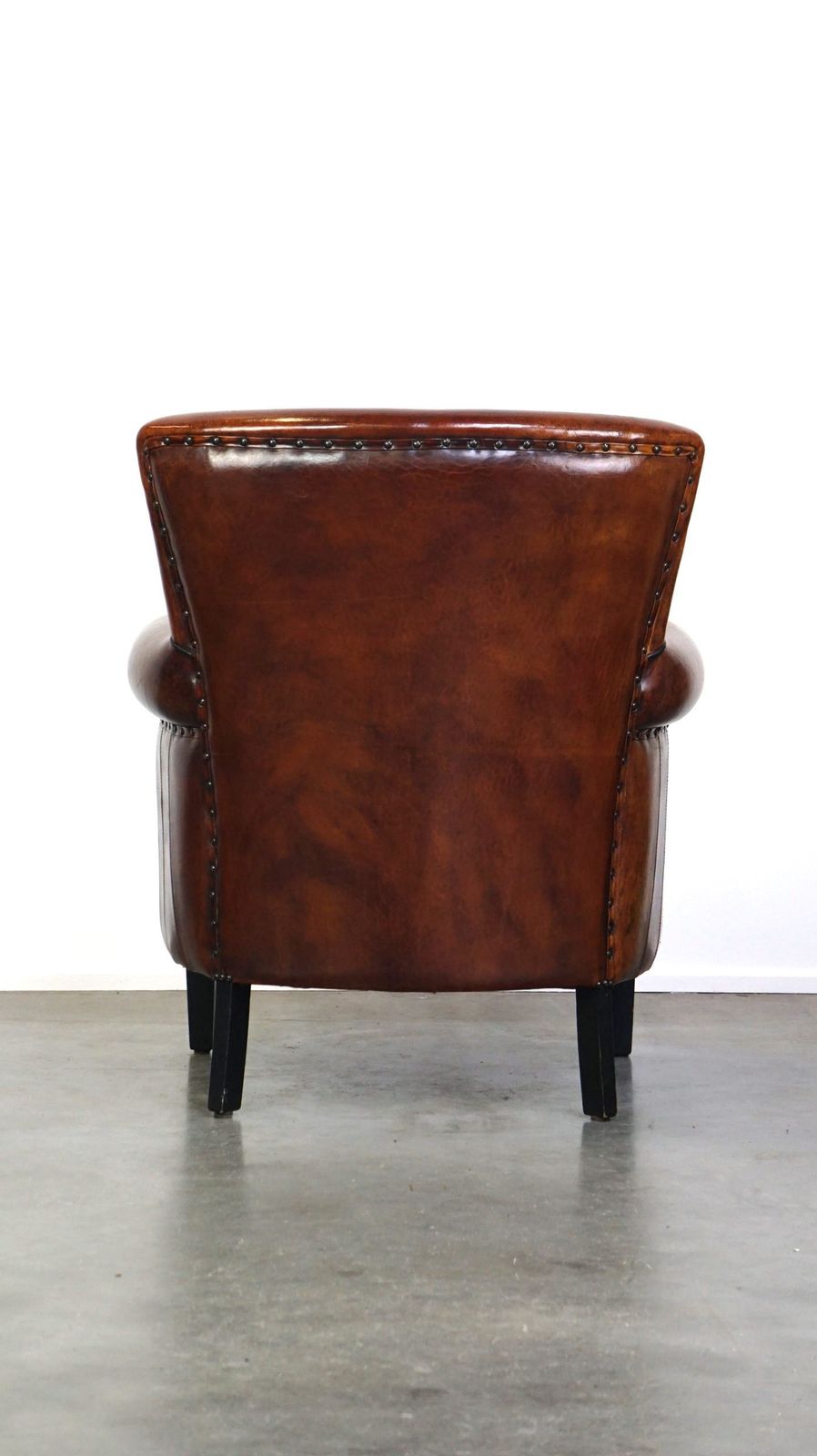 Comfortable Sheepskin Armchair With A Beautiful Finish And Deep Color photo Furniture