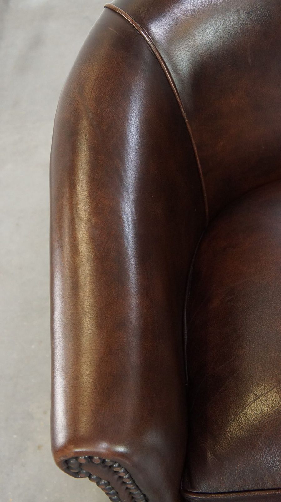 Beautiful Luxurious Dark Cowhide Club Chair With Ball Feet In English Style photo buy