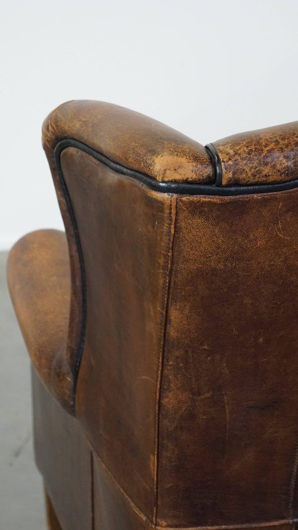 799.4753999999999 Characteristic And Comfortable Sheepskin Wing Chair With A Beautiful Patina photo