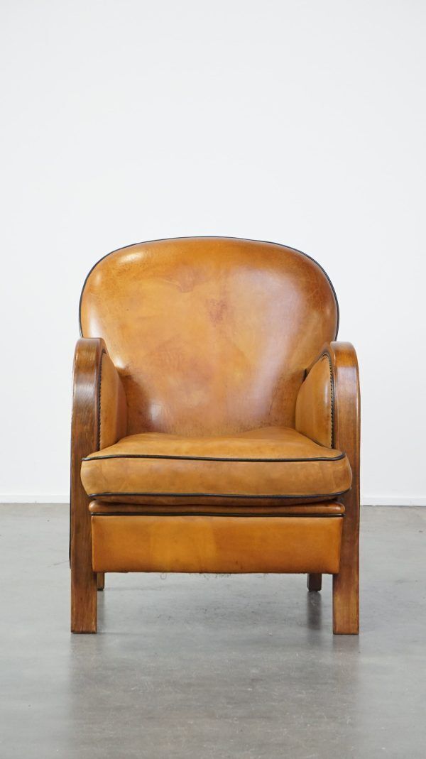 Unique, Luxurious Sheepskin Armchair Combined With Wood And Finished With Decorative Nails photo furniture