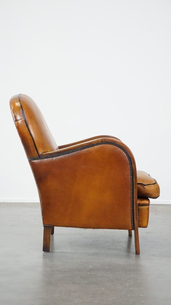 Unique, Luxurious Sheepskin Armchair Combined With Wood And Finished With Decorative Nails photo for sale