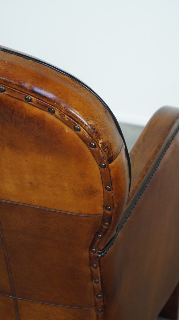 1361.7080999999998 Unique, Luxurious Sheepskin Armchair Combined With Wood And Finished With Decorative Nails photo
