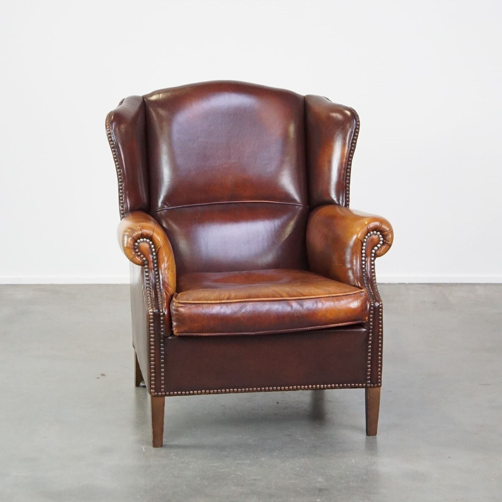 Comfortable, Elegant, Stately Wing Chair Made Of Sheepskin In A Beautiful Warm Color