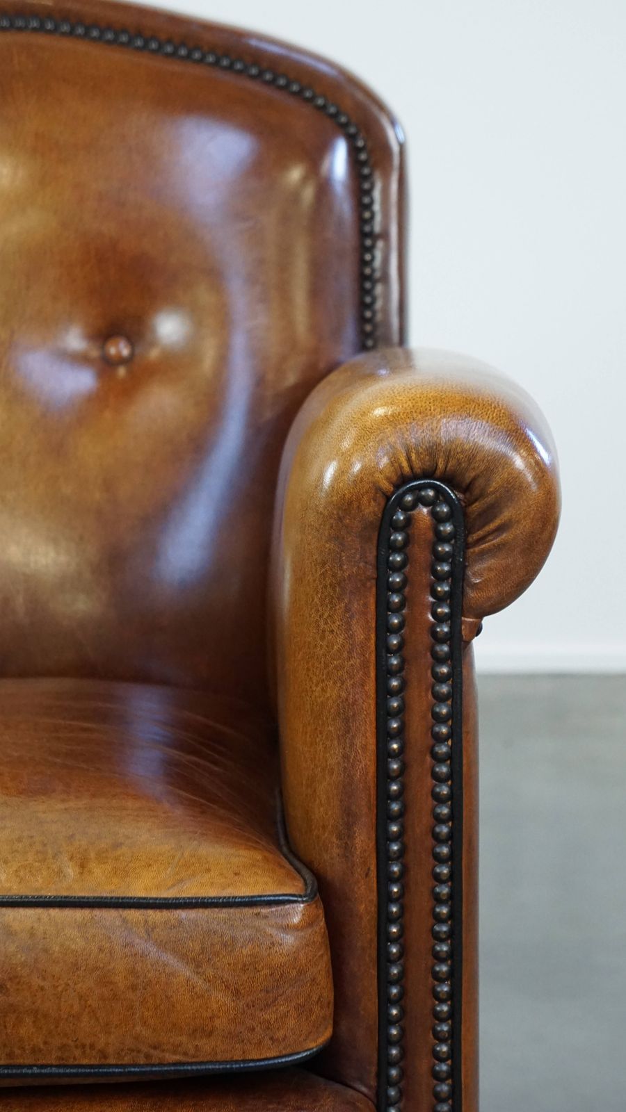 photo for sale Well Maintained Sheepskin Leather Design Armchair, Luxuriously Finished With Decorative Nails And Black Piping