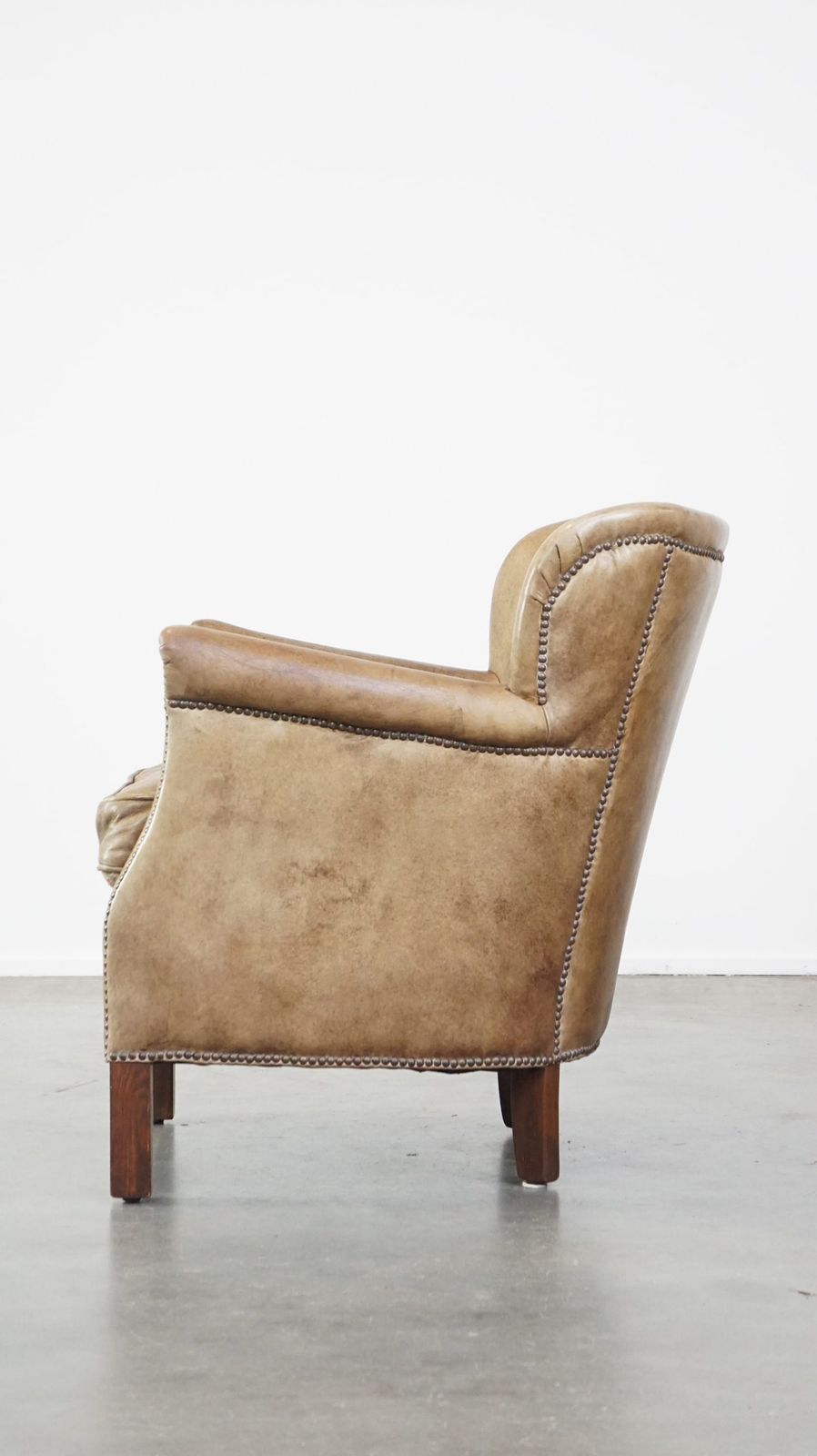 Stijlvolle koeienhuid fauteuil met omkeerbaar kilim zitkussen photo 887.2226999999999