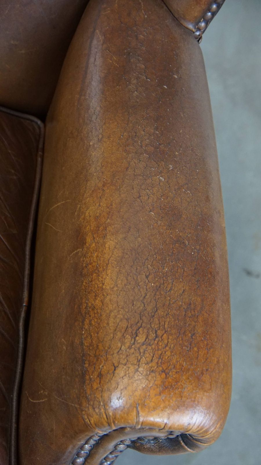 Charming, Subtle English Style Sheepskin Wing Chair With Beautiful Colours And Excellent Seating Comfort photo vintage