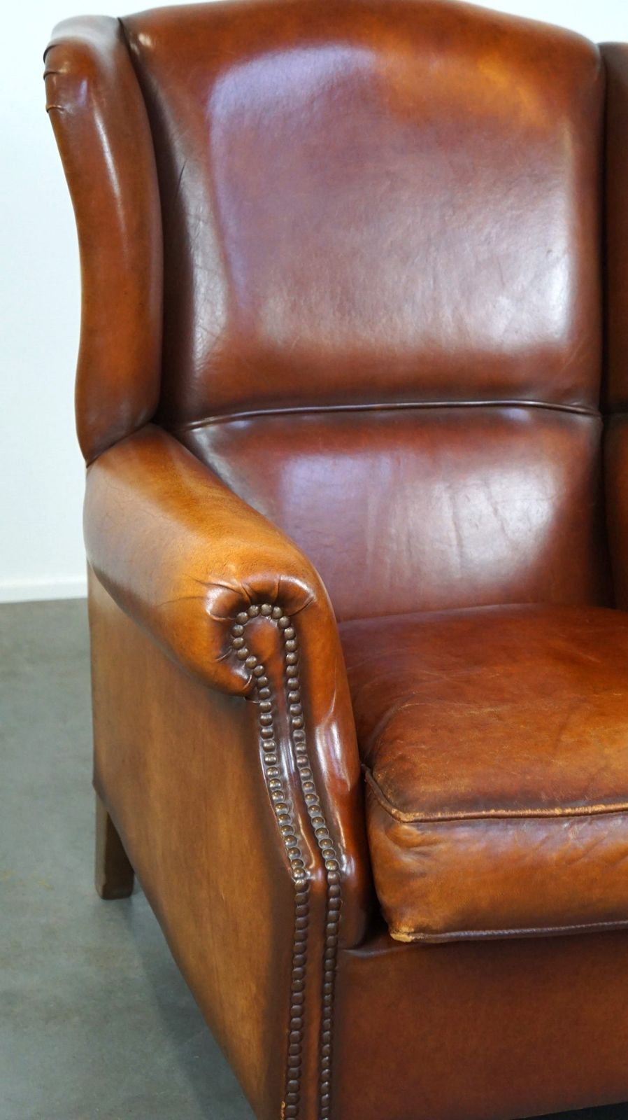 photo furniture Beautiful And Comfortable Sheepskin Wing Chair With A Wonderful Patina