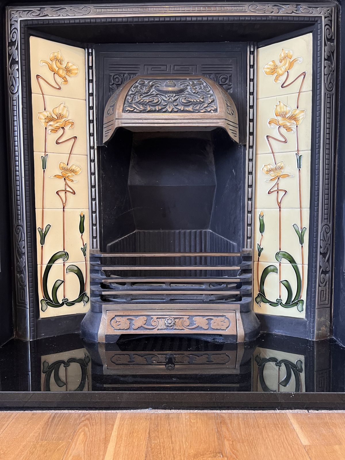 photo for sale Art Nouveau Cast Iron Fireplace With Tiled Flower Decoration – Original 1930s Feature From Wanstead, London