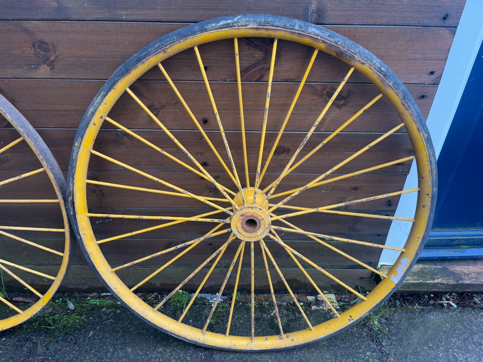 Pair Of Large Antique Yellow Metal Spoked Cartwheels With Vulcanised Tyres photo for sale