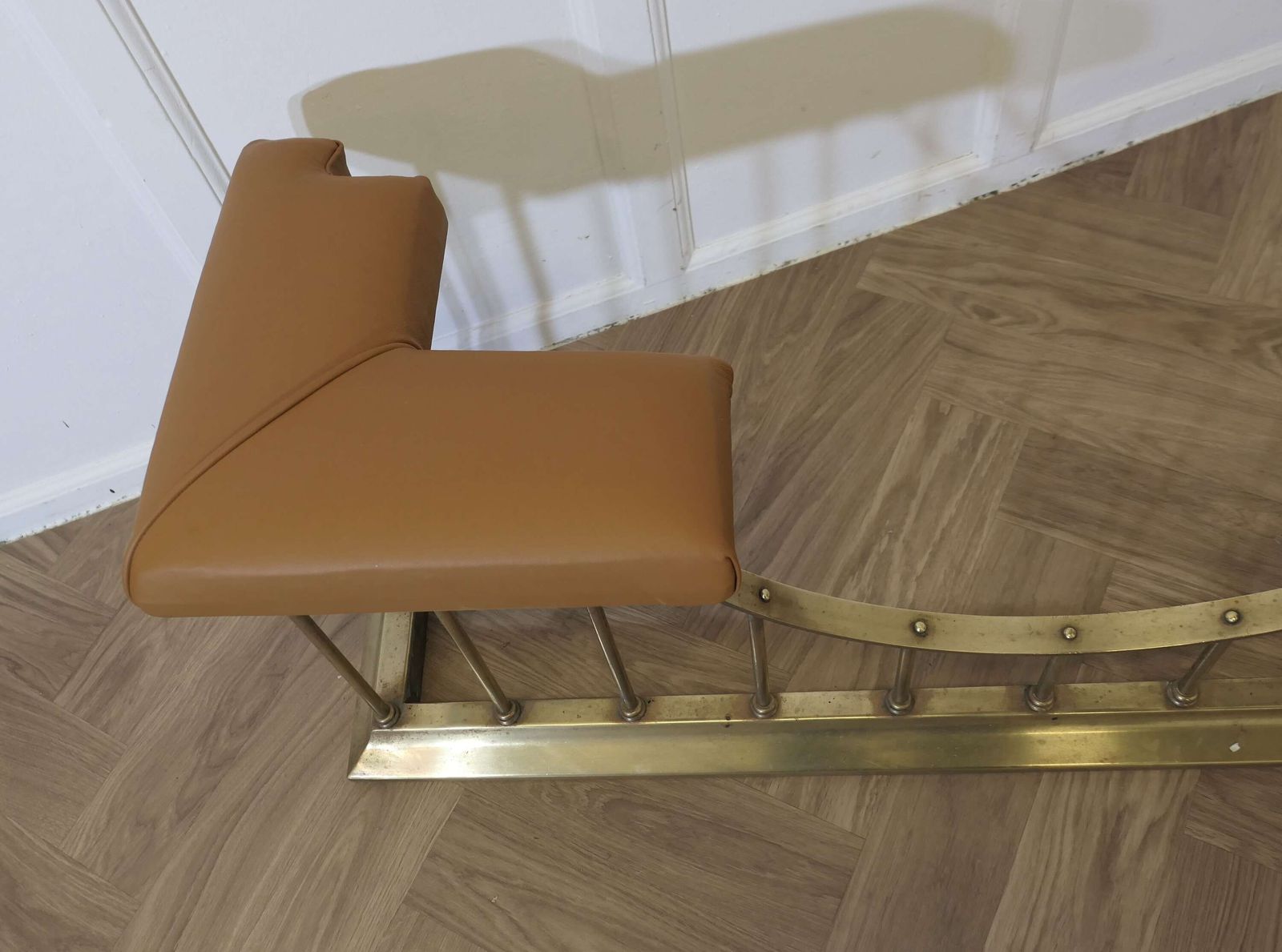 Leather Upholstered Brass Club Fender photo vinterior