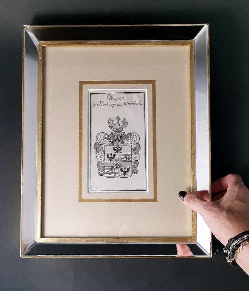 photo vintage Mirror Frame With Engraved Dutch Print Depicting Dukes Of Mirandola Coat Of Arms