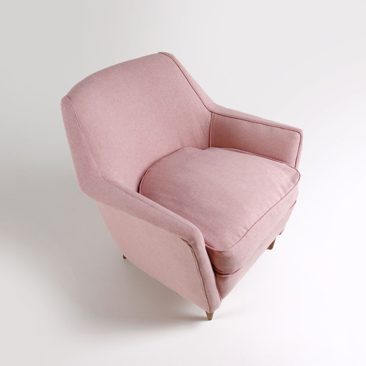 Armchair With Tapered Wooden Legs From The 50s photo for sale