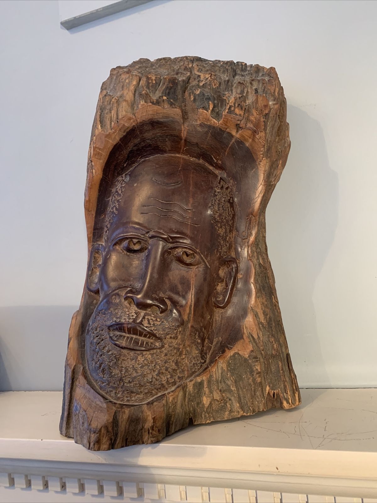 African. Authentic Antique Art Tribal Carved Face In Wooden Tree Trunk photo for sale