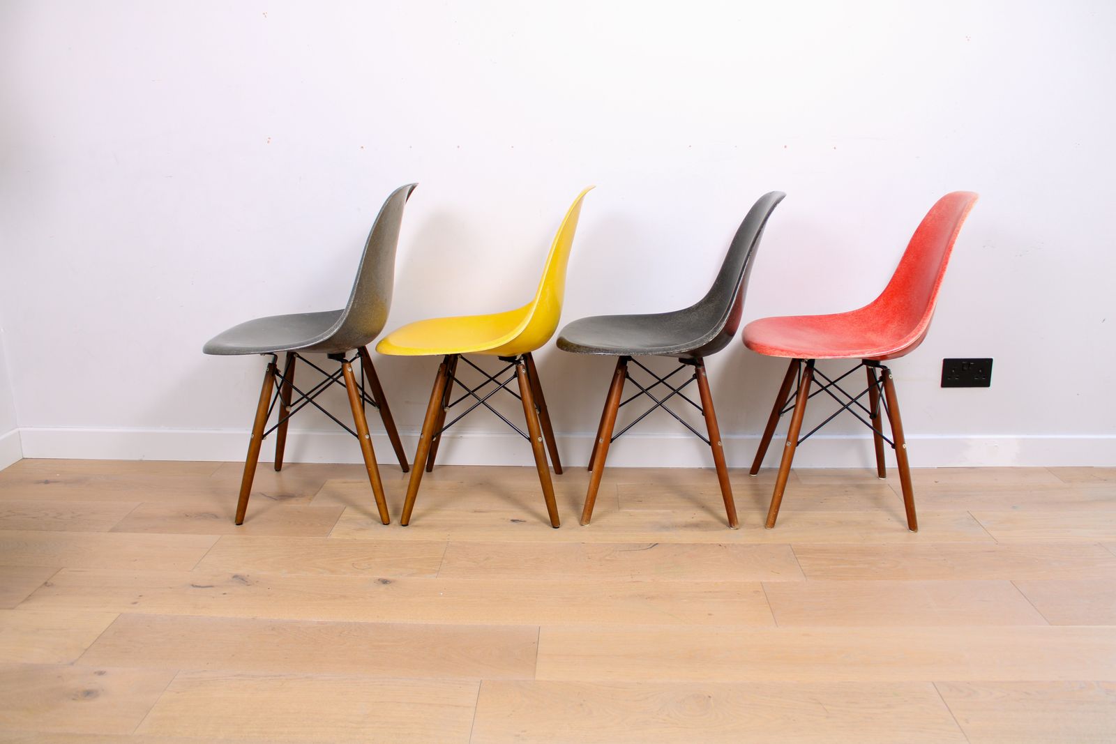 photo furniture A Mixed (Harlequin) Set Of 8 Original Herman Miller Fiberglass Eames Dsw Chairs