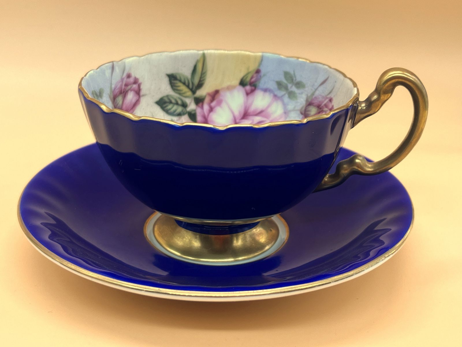 photo for sale Aynsley China Cabbage Rose Cobalt Blue And Gold Footed And Fluted Cabinet Tea Cup & Saucer Duo.