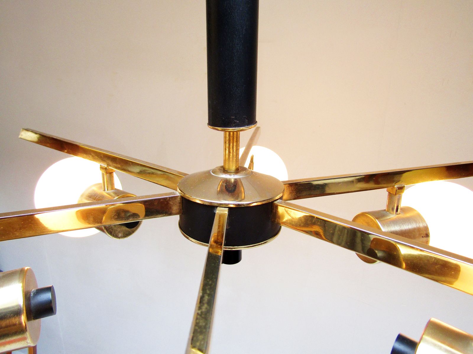 photo furniture Large 1960s French Starburst Chandelier In Brass And Black By Maison Arlus