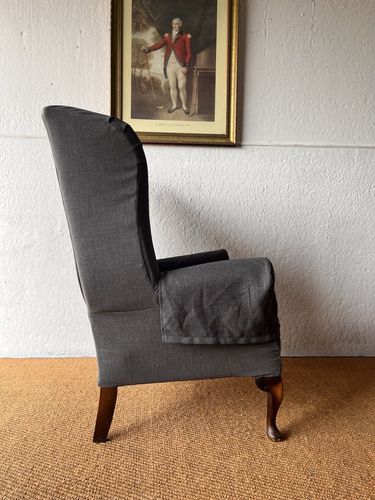 photo furniture Large Comfortable Antique Wingback Chair With Clean Grey Coloured Loose Covers