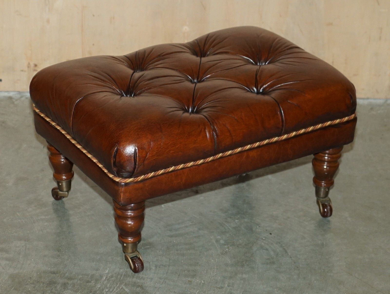 Pair Of Restored Brown Leather Chesterfield Tufted Porcelain Castors Footstools photo furniture