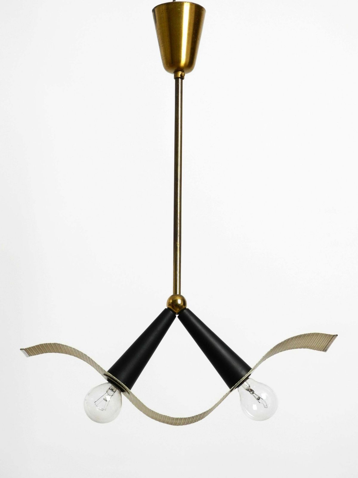 Mid Century Brass Ceiling Cone Lamp With A Curved Perforated Sheet Lampshade photo for sale