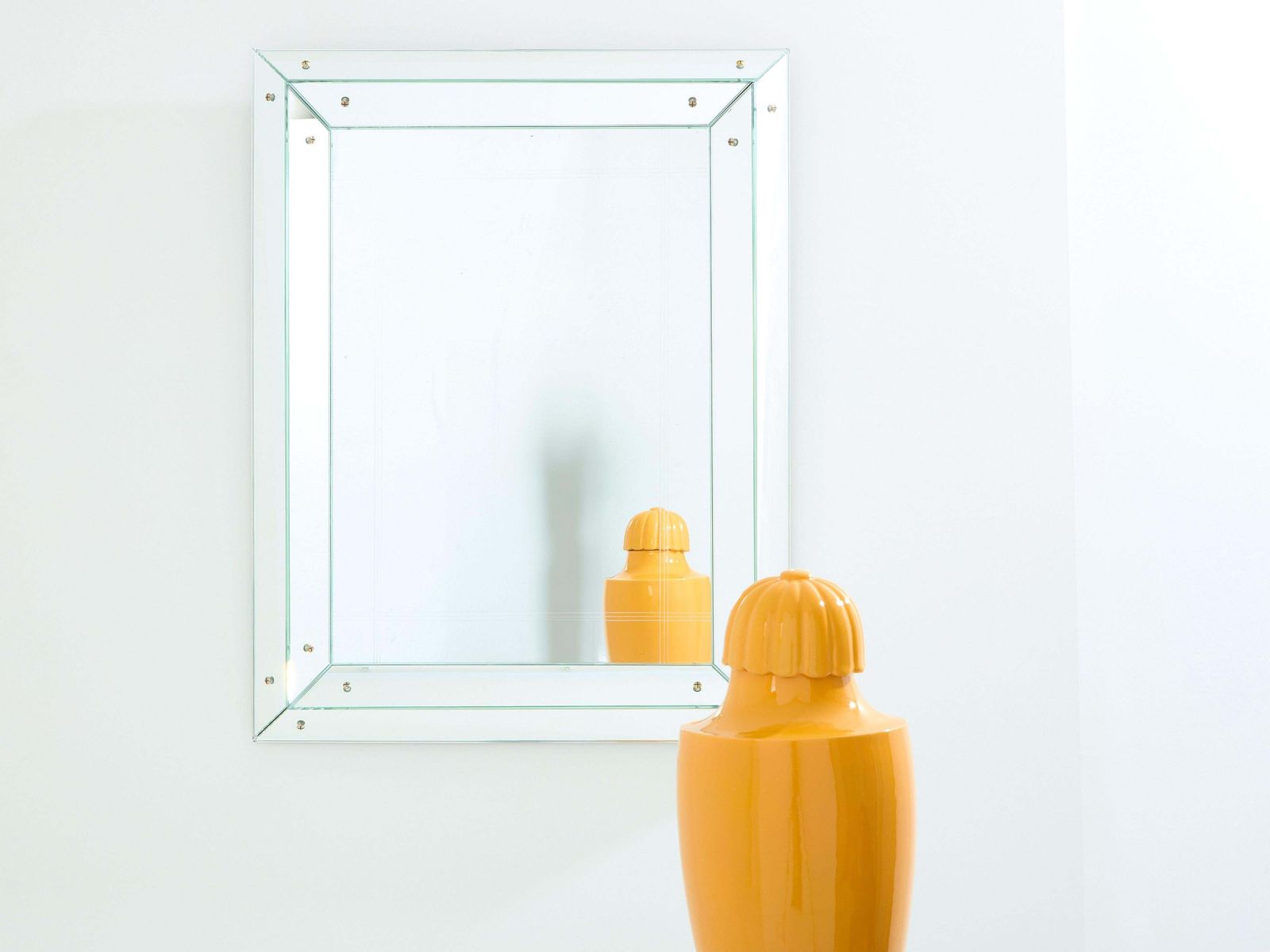 Miroir parclose Art déco à facettes Jacques Adnet, 1947 photo for sale
