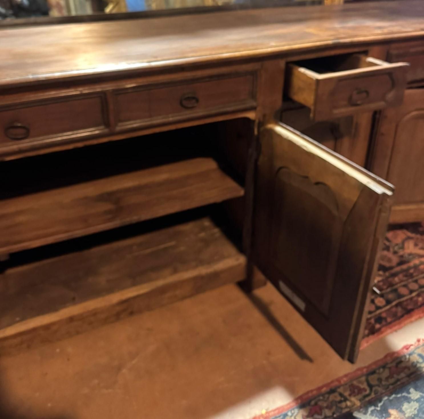 Low Sideboard In Walnut Wood, Five Carved Panel Doors And Five Drawers, France photo buy