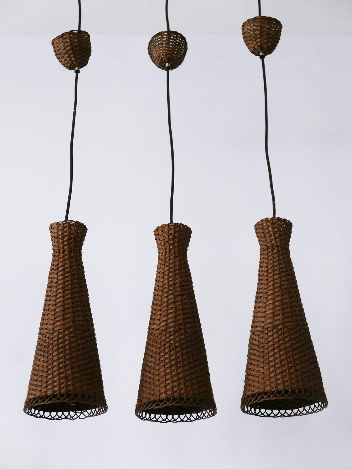 Set Of Three Lovely Mid Century Modern Rattan Diabolo Pendant Lamps 1960s photo vintage