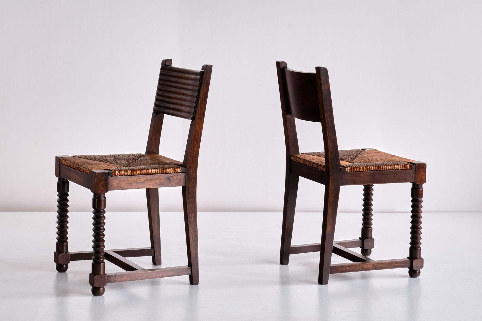 Set Of Six Victor Courtray Dining Chairs In Oak And Rush, France, 1940s photo vinterior