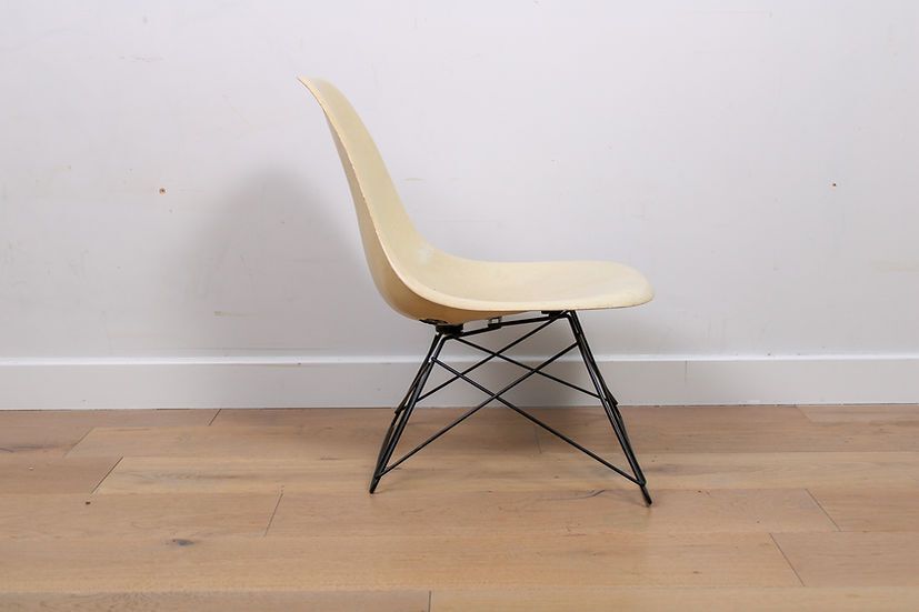 A Vintage Mid Century Eames Fibreglass Lsr Chair By Herman Miller Cats Cradle photo furniture