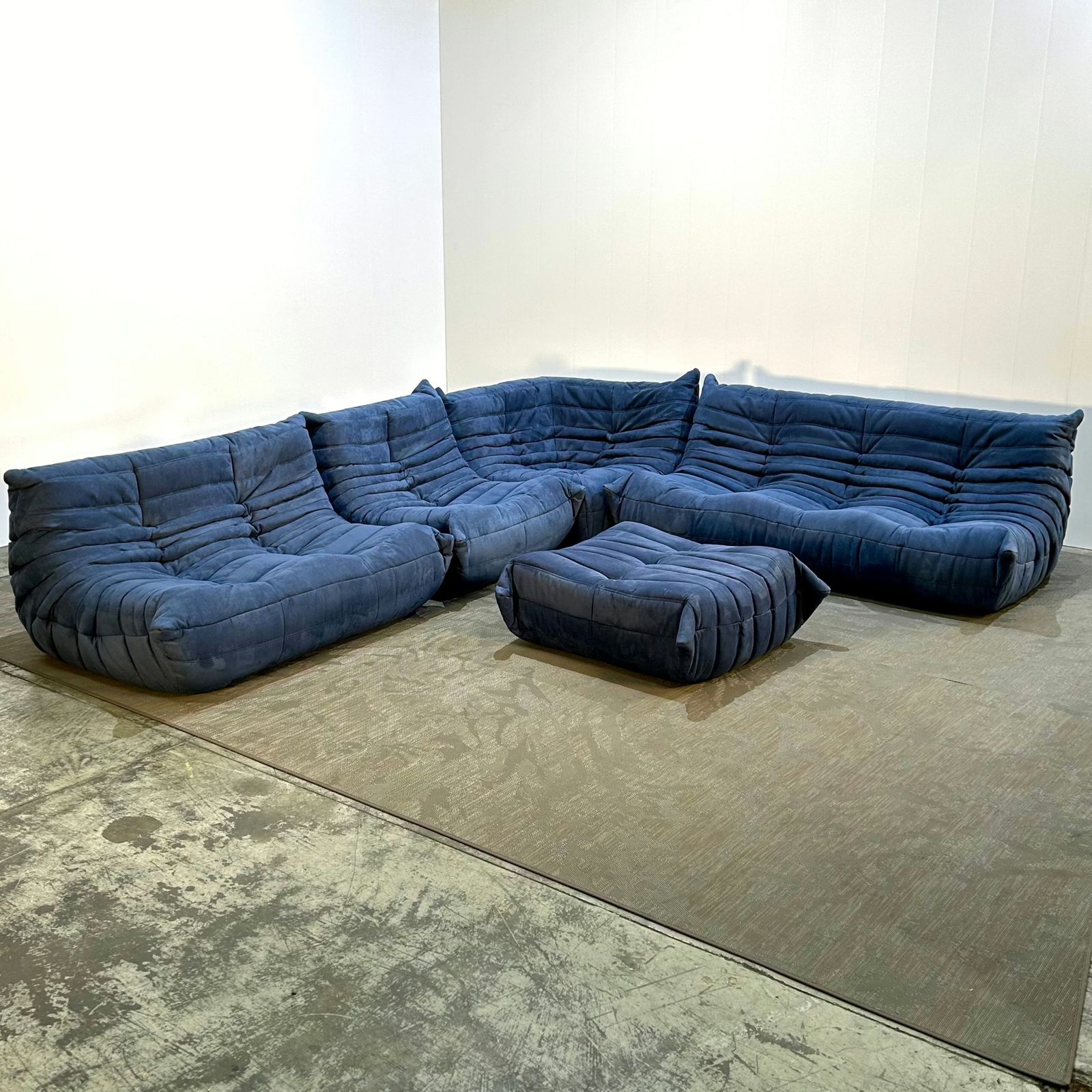 photo furniture Ligne Roset Togo Blue Modular Togo Sofa And Footstool By Michel Ducaroy, Set Of Five