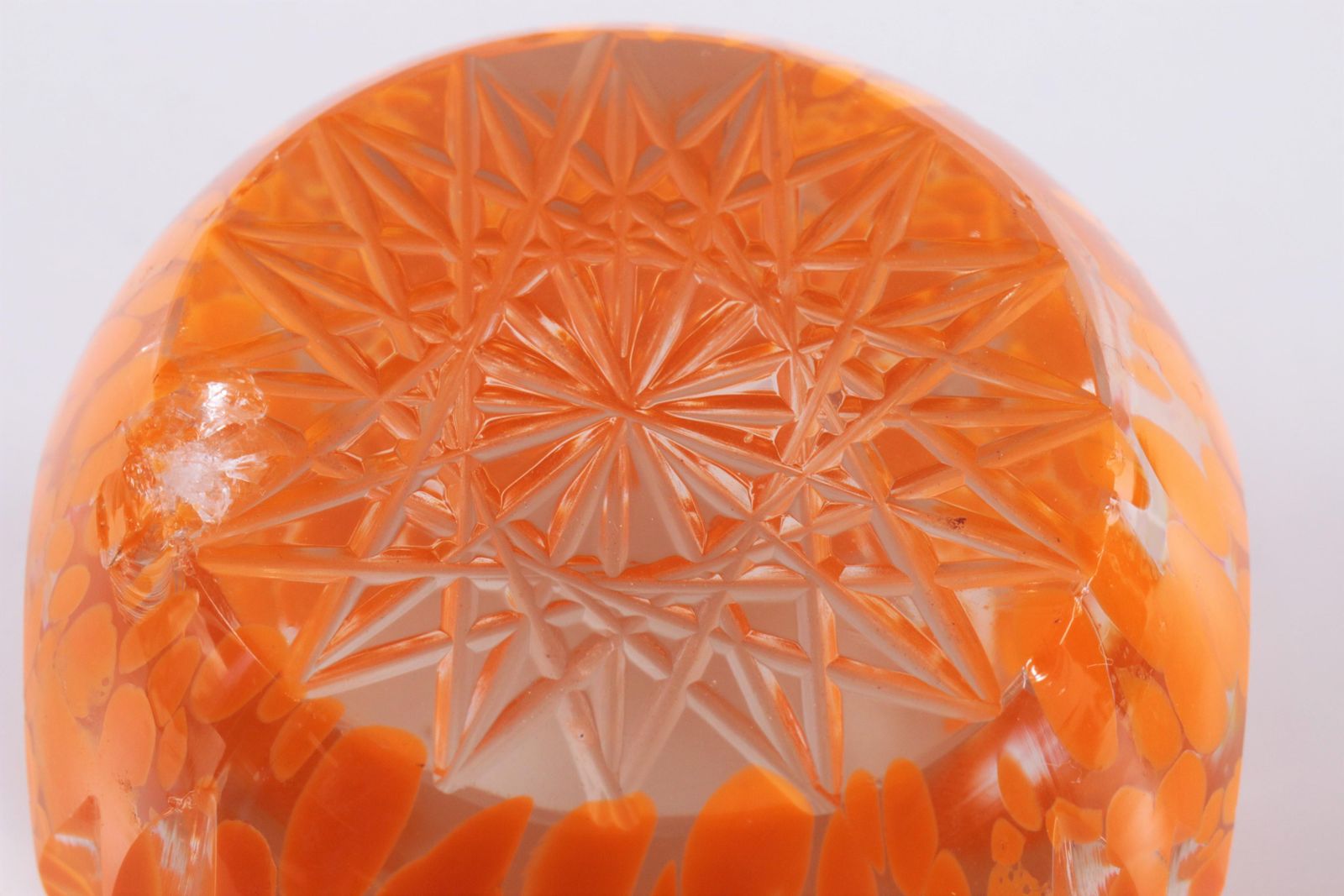 Paperweight With A Nice Sleek Finish And A Beautiful Orange Colour photo vinterior