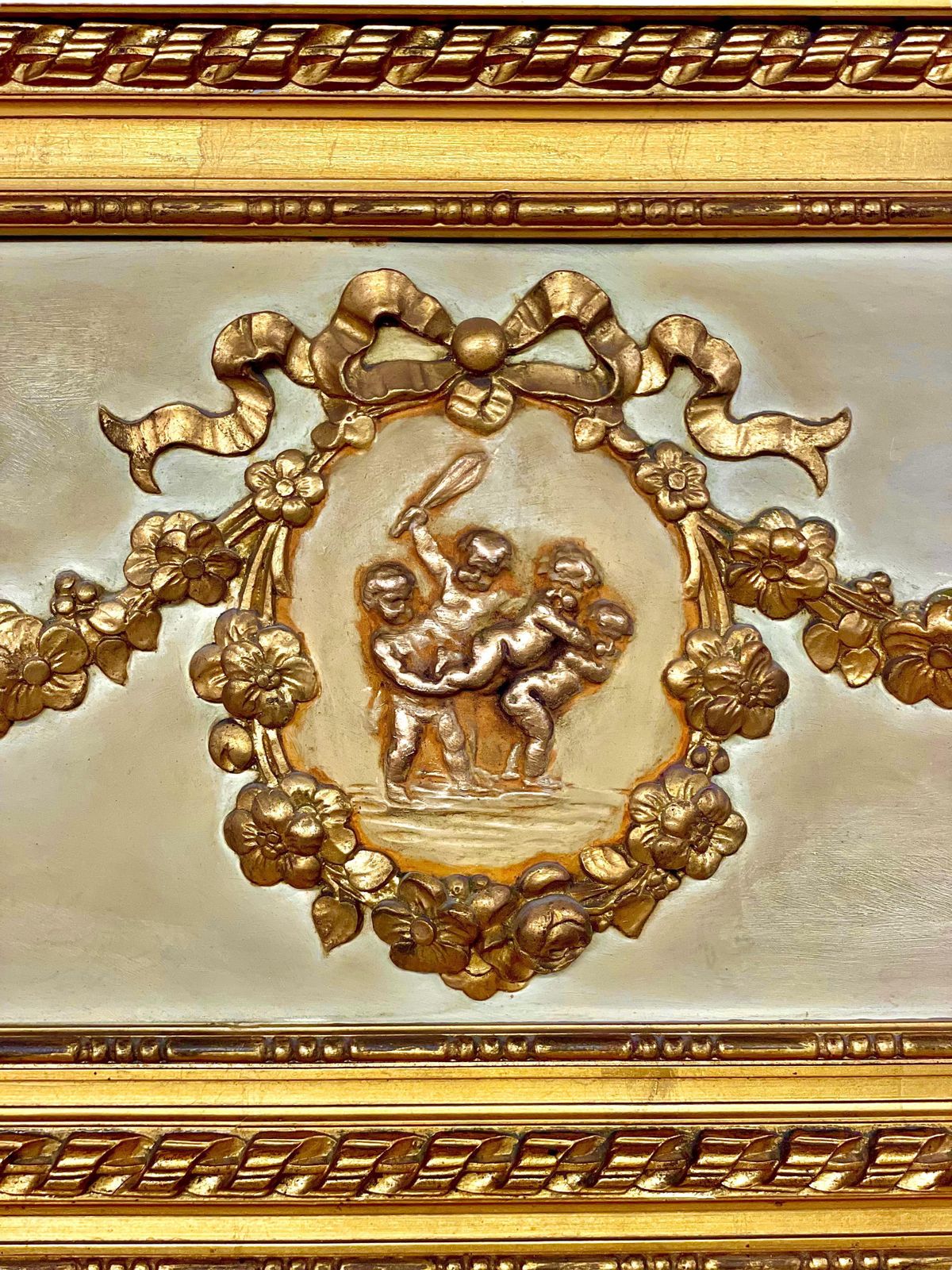 photo furniture 19th Century Louis XVI Trumeau Gilded Mirror With Mischievous Cherubs Design