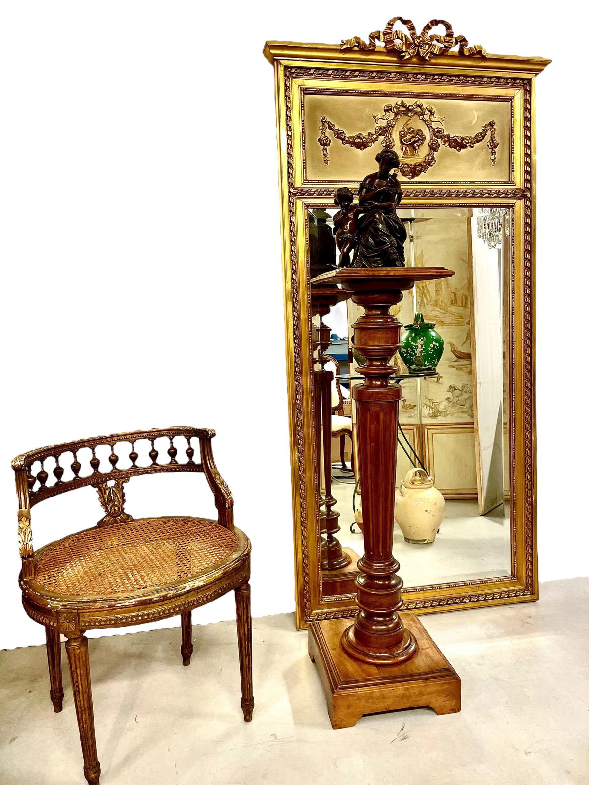 2087.0 19th Century Louis XVI Trumeau Gilded Mirror With Mischievous Cherubs Design photo