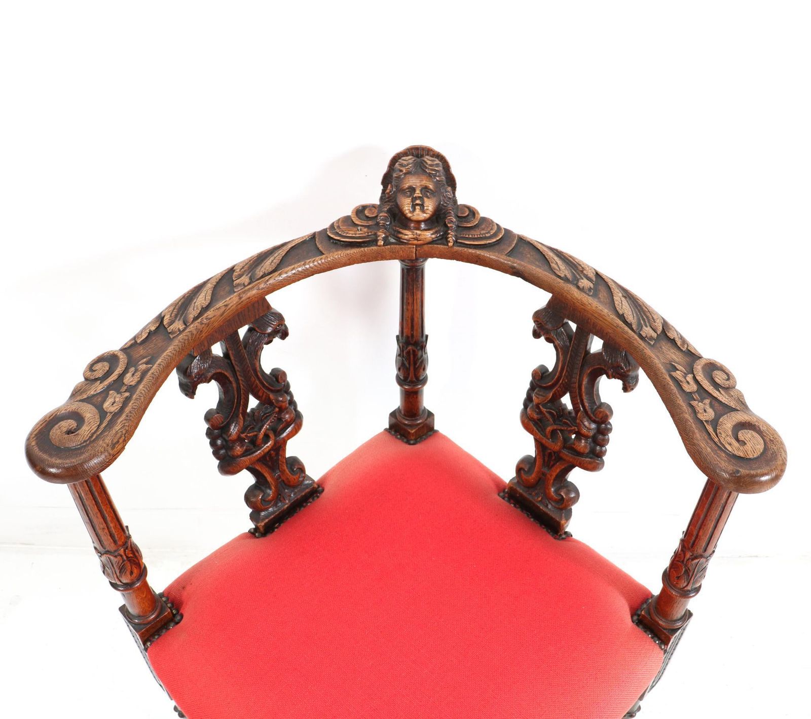 812.0 French Renaissance Revival Oak Carved Corner Armchair, 1890s photo