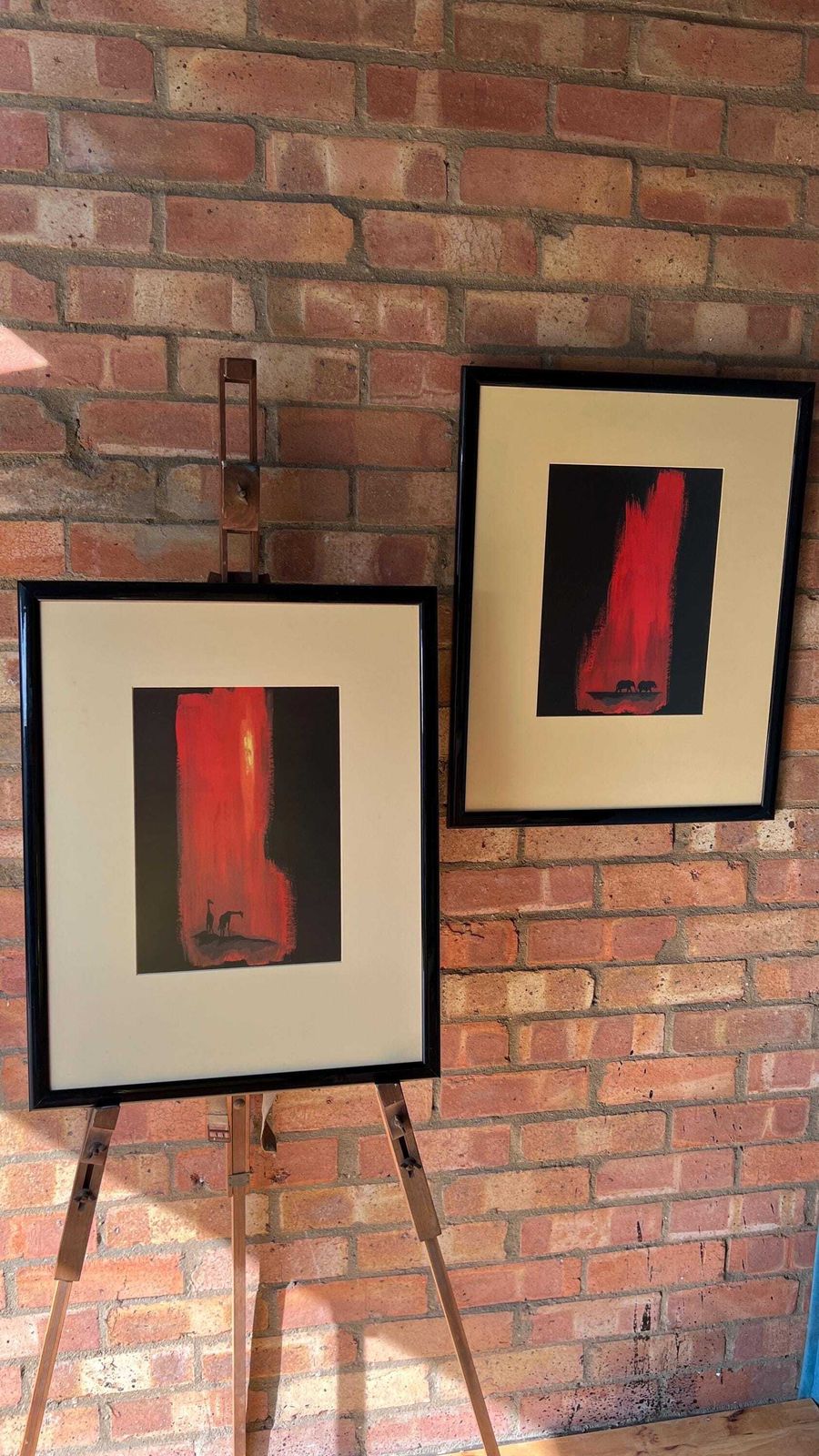 photo for sale Set Of Two Contemporary Fine Art Prints – Red And Black Elephant & Giraffe Scenes