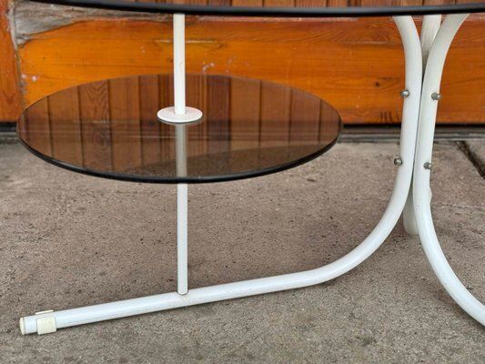 photo furniture Coffee Oval Table With Metal Legs And Smoky Glass Top, 1990s