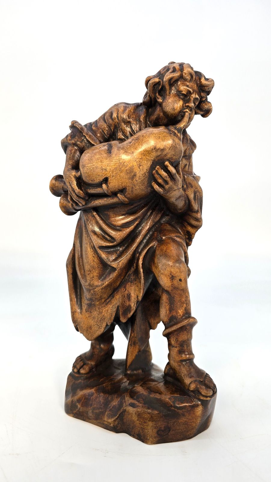 A Swiss Vintage Wooden Limewood Carving A Man Playing The Bagpipes, Circa 1880