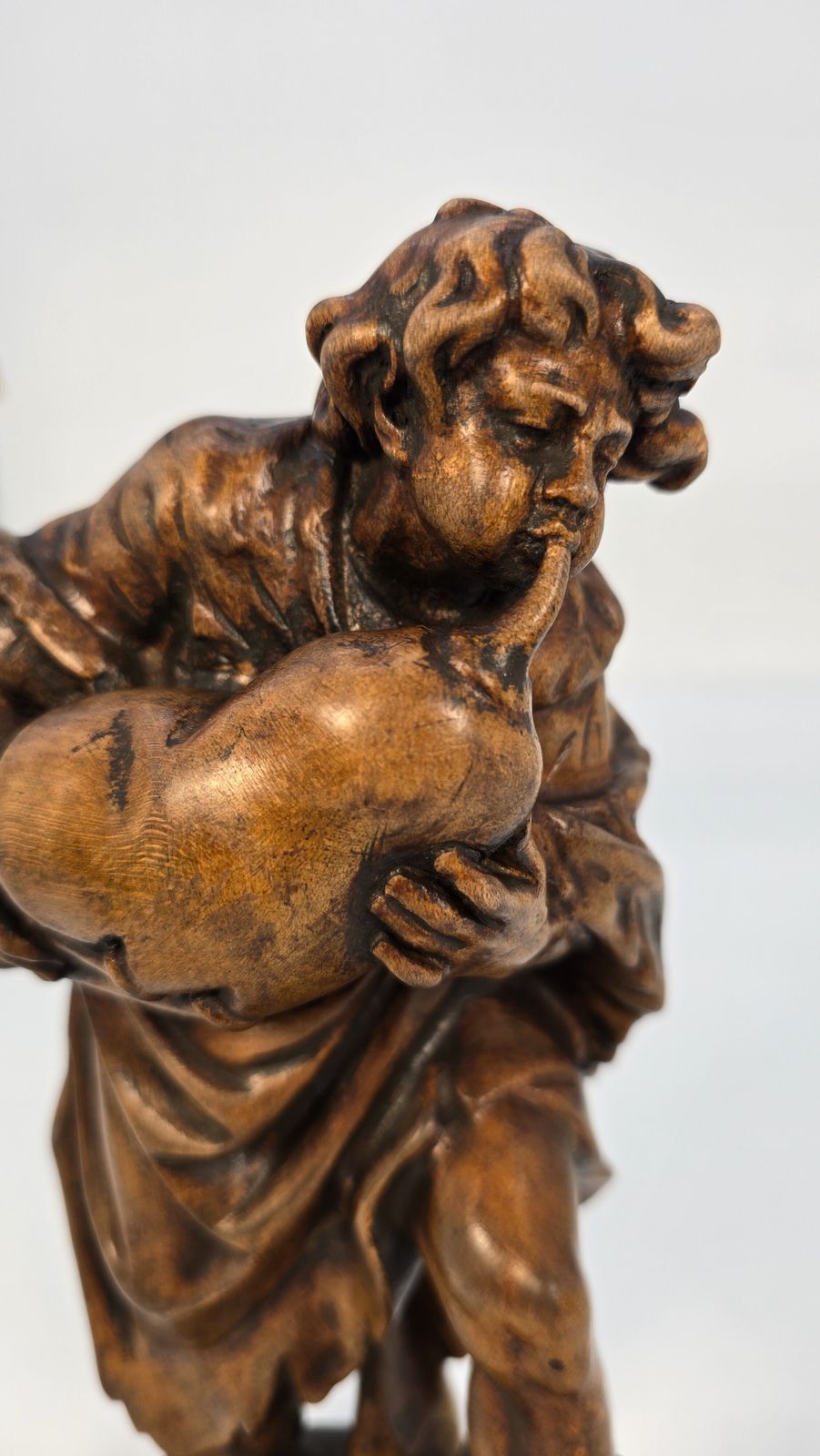 photo furniture A Swiss Vintage Wooden Limewood Carving A Man Playing The Bagpipes, Circa 1880