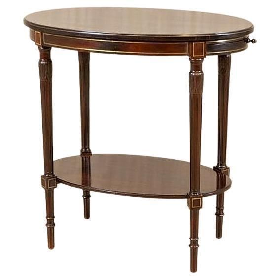 English Walnut Oval Coffee Table From The Early 20th Century