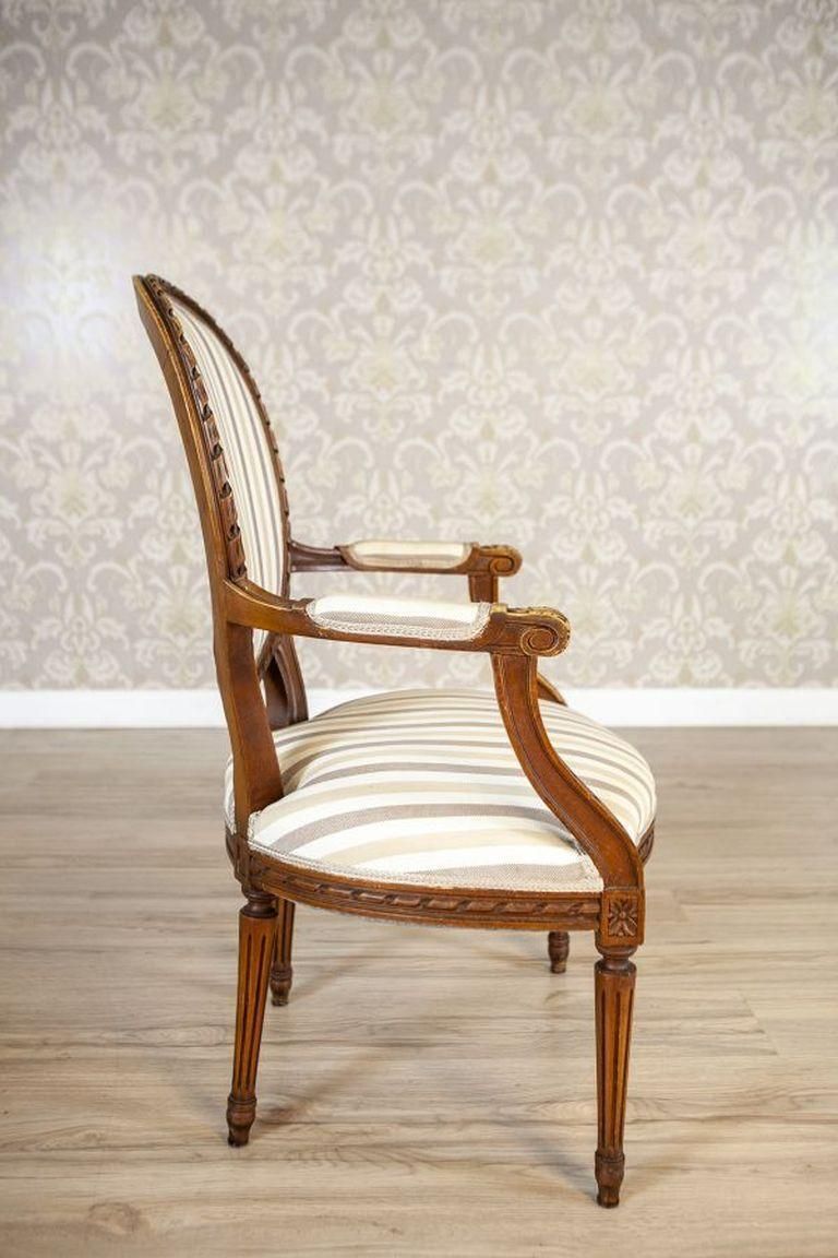 French Louis XVI Walnut Armchair From The Early 19th Century photo for sale