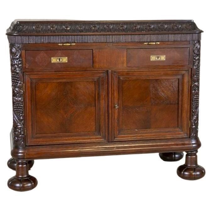 Early 20th Century Oak Commode In Brown With Drawers