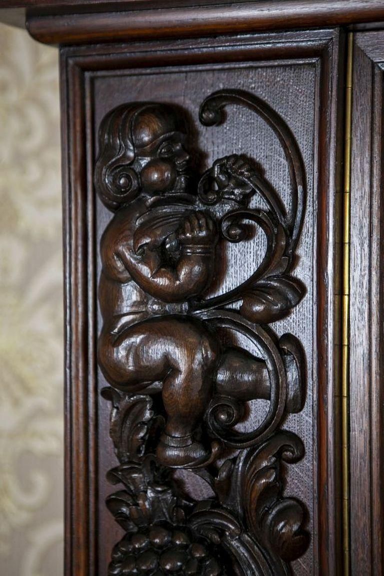photo buy Decorative Oak Sideboard From The Interwar Period In Dark Brown