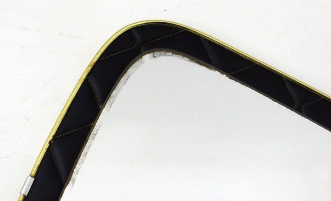 photo furniture Mid Century Free Form Wall Mirror With Quilted Black Imitation Leather Frame & Gold Metal, 1950s