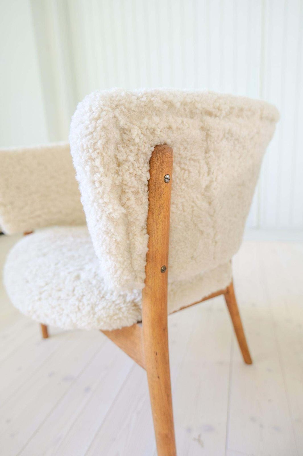 photo buy Mid Century Lounge Chairs In Sheepskin/Shearling And Stained Wood, Sweden, 1962