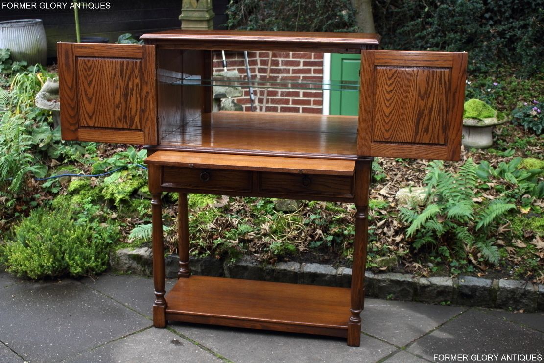 A Jaycee Autumn Gold Carved Oak Drinks / Cocktail / Wine Cabinet photo 495.0