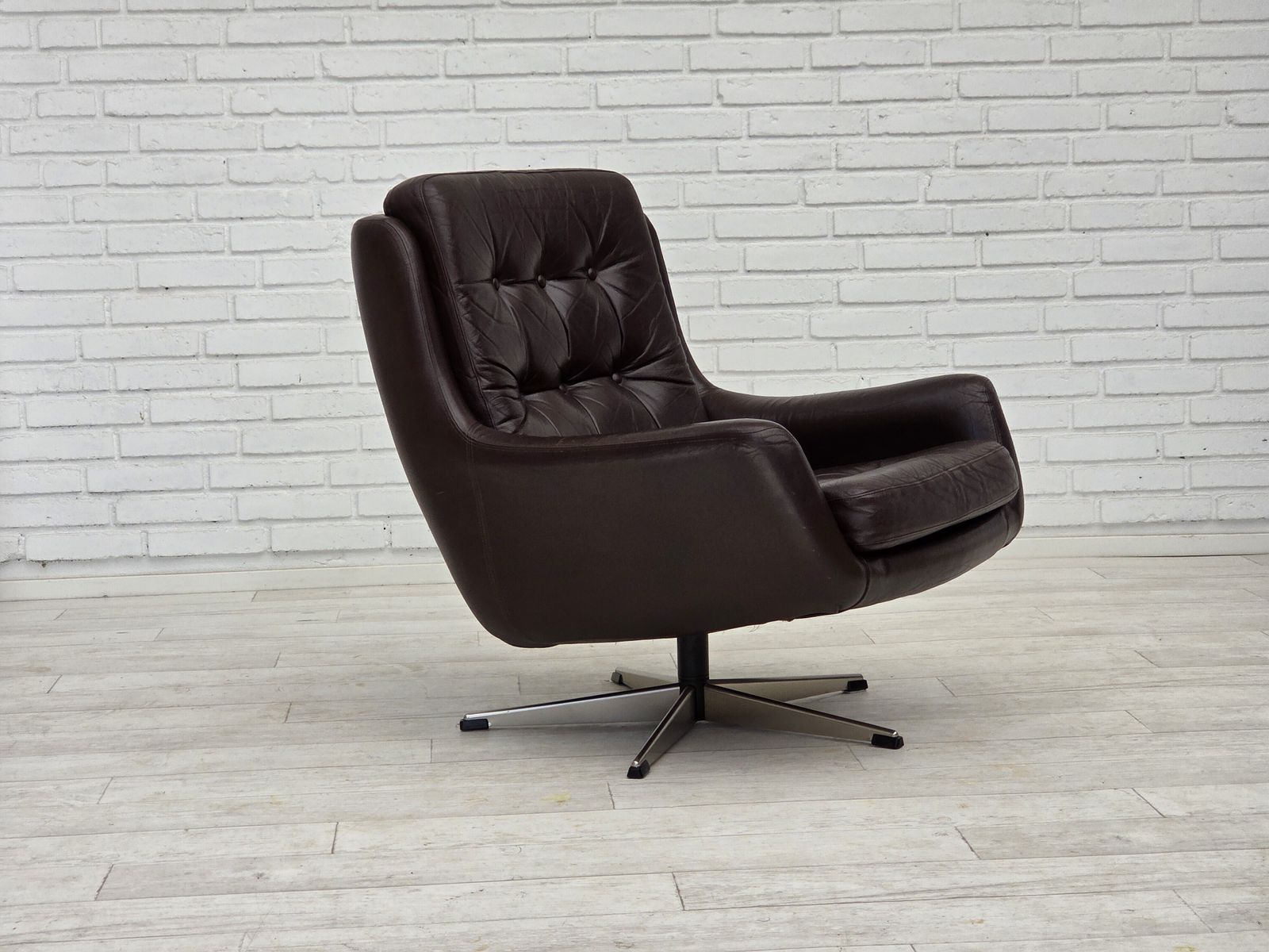 photo furniture 1970s, Set Of Two Swivel Lounge Chairs With Footstool, Leather.